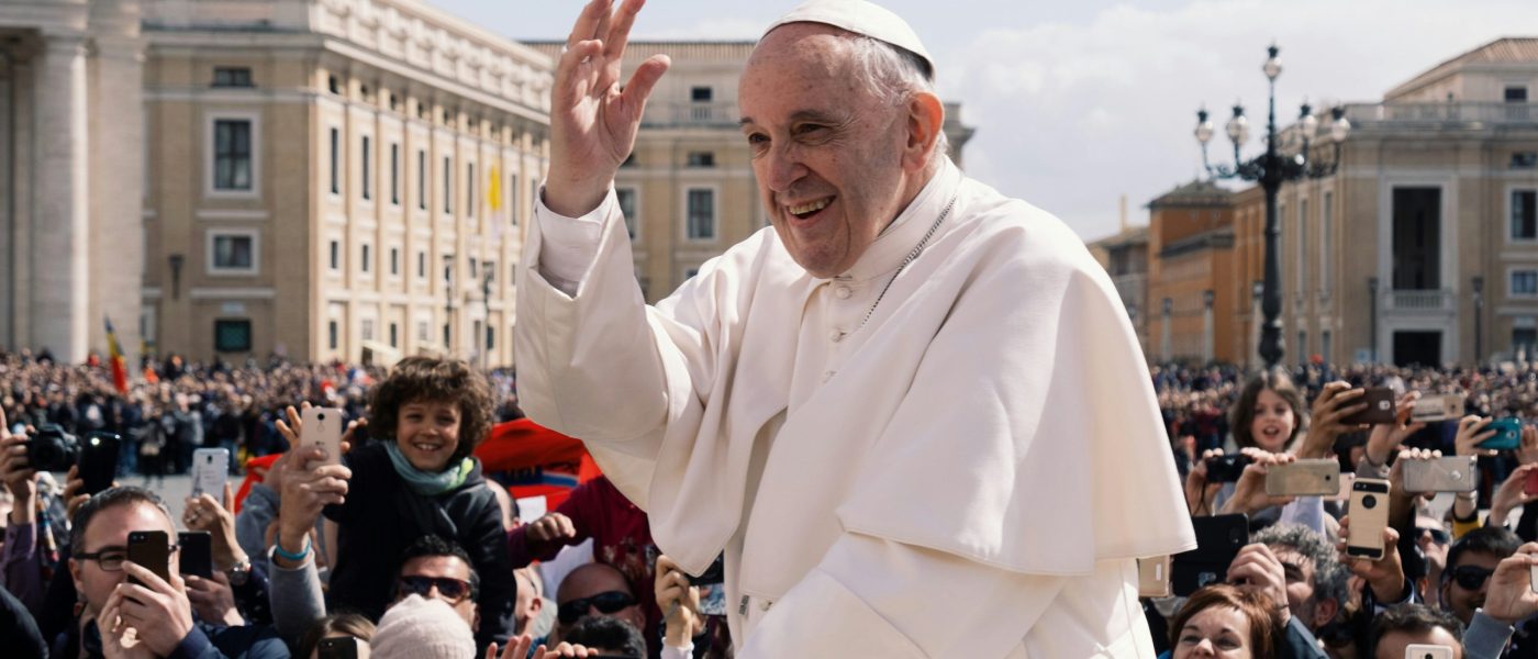 Pope Francis greets a crowd in Vatican City - UNSPLASH Pope Francie greets a crowd in Vatican City