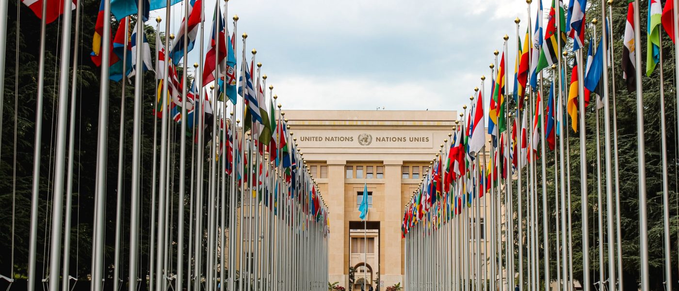 United-Nations-rows-of-flags Two rows of national flags outside of a UN building